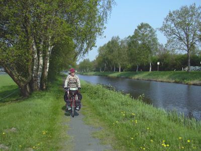 Nelly cycling along the first of the canals