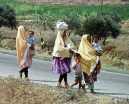 Syrian women could be dressed veiled or in mini-skirt