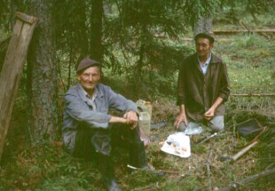 Forest workers near to the border of the Soviet-Union offering us a wodka for warming up.