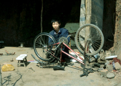 exporting modern bicycles, but repairshop in villages are eons away from those