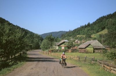 A bad road, little traffic and very scenic in a setting of small agricultural landscape
