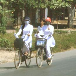 Schoolgirls of the High school in their tidy white tunicas